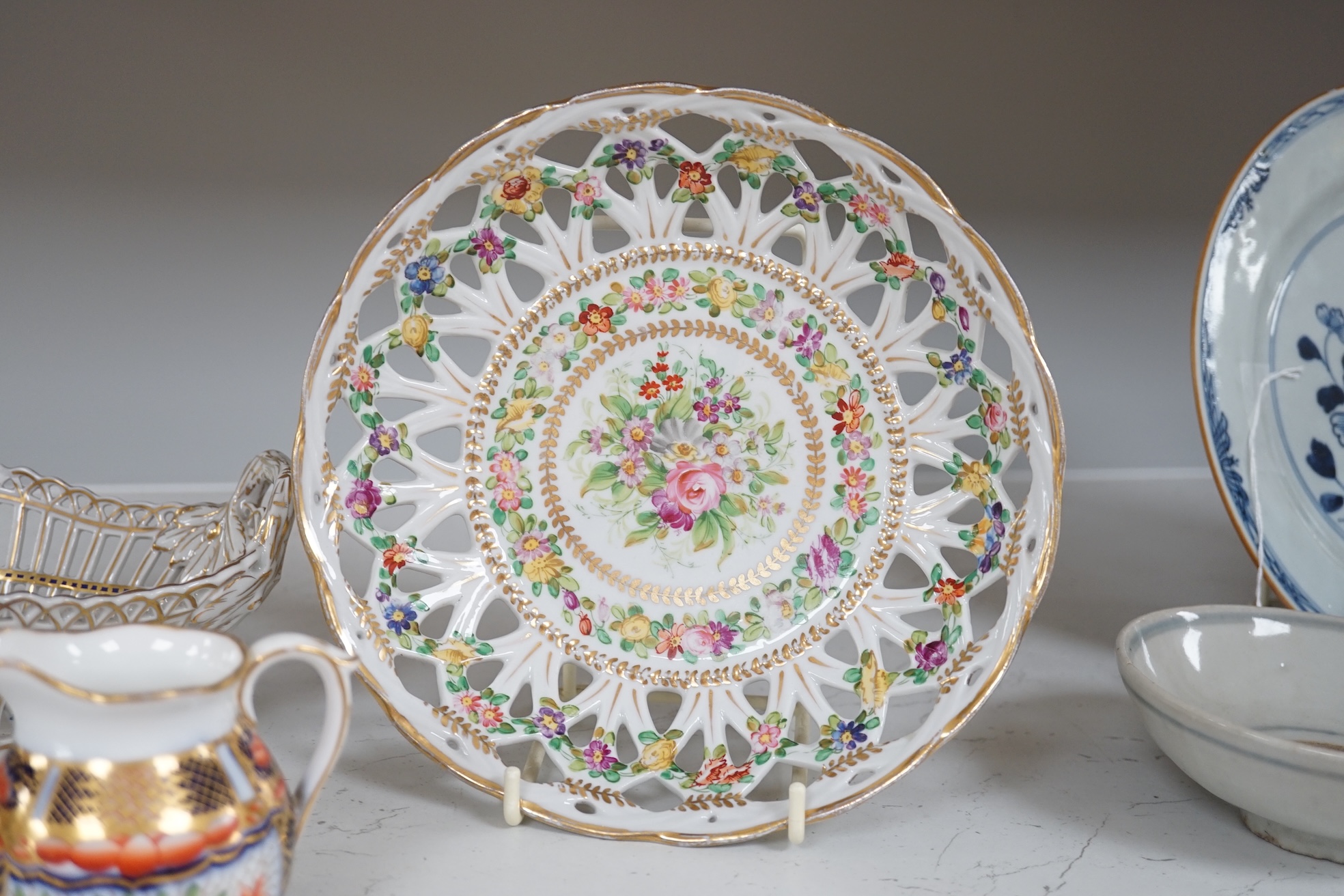 Three Imari pattern ceramic pots, a Crook’s pierced floral decorated plate, diameter 21cm, a pierced Dresden basket, and a small dish. Condition - fair to good.